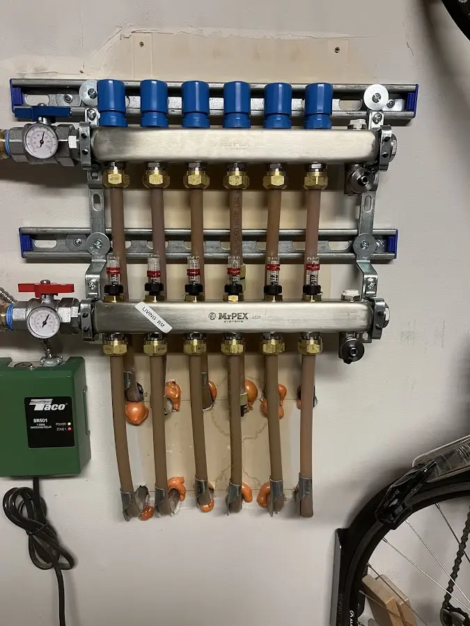 Plumber performing Gas Leak Detection at a residential property in Spring City